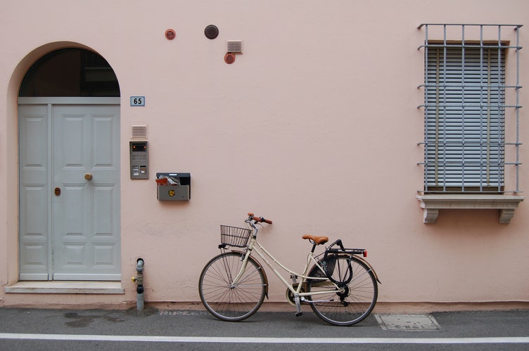 A house with an intercom system outside