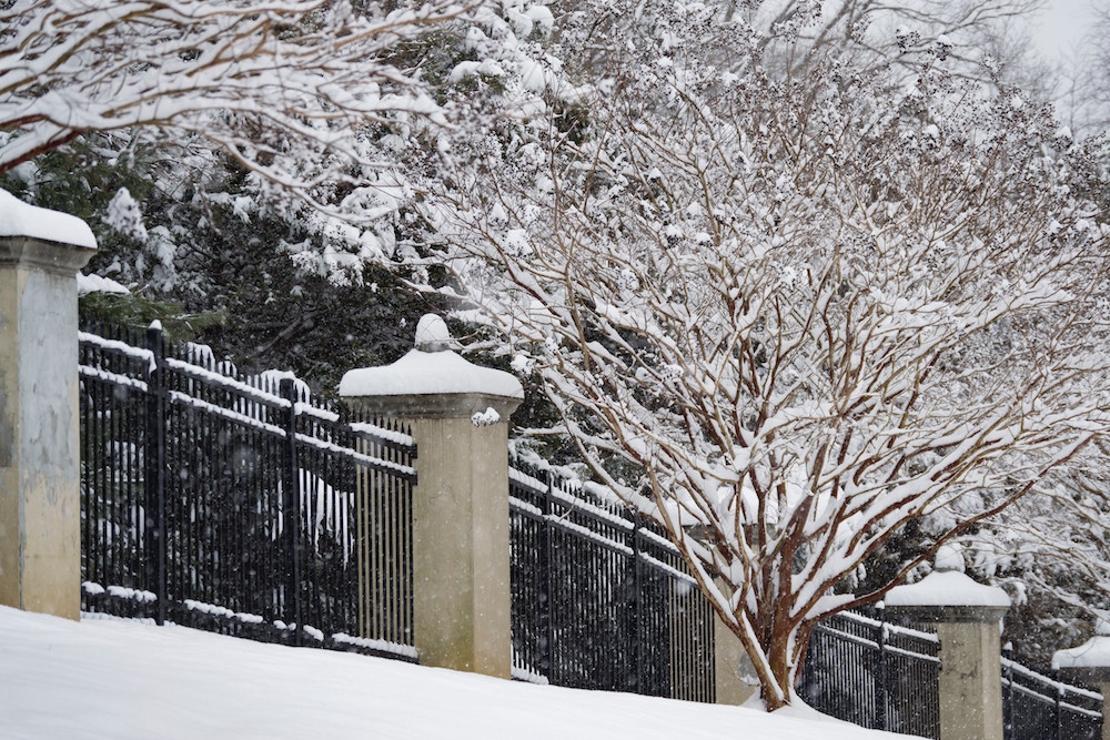 metal gate in the snow 