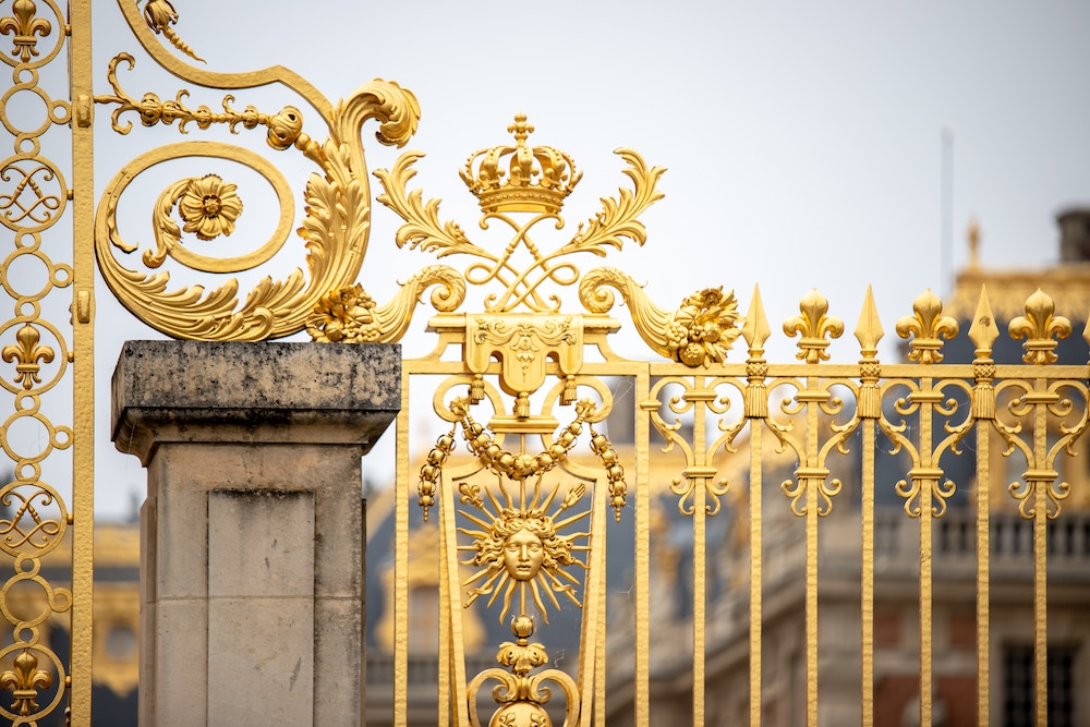 intricate gold steel gate design