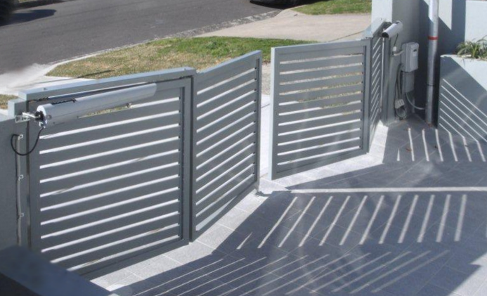 Bi-fold swing gates